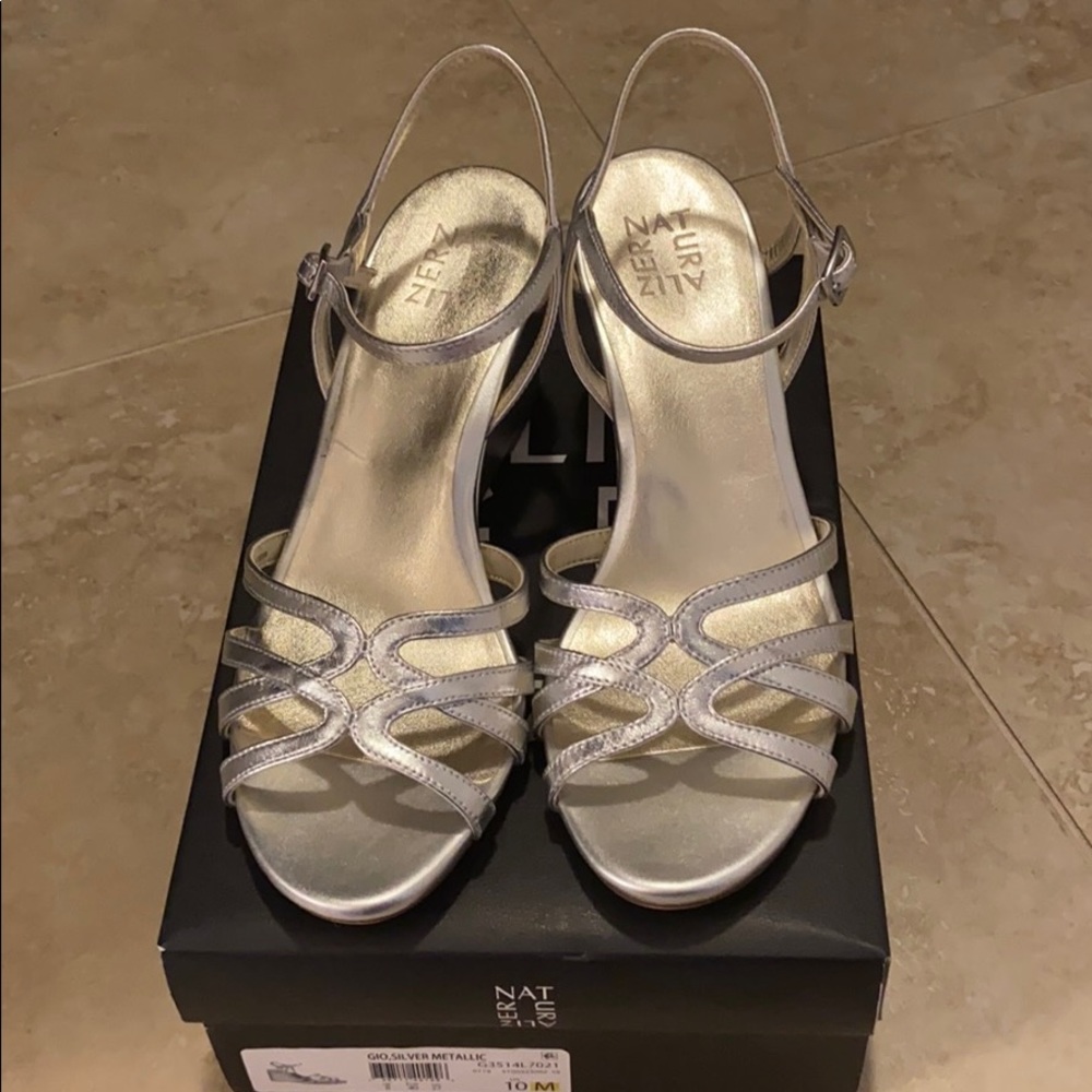 Silver Wedge metallic sandals.